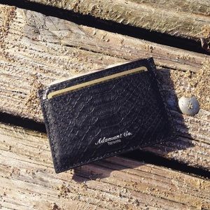 Black snake skin card holder.